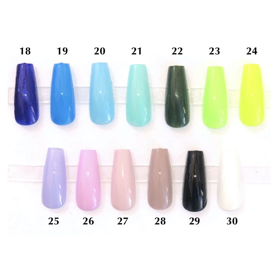 A chart showing press on nails of various cool colors such as green, blue, purple, black and white.
